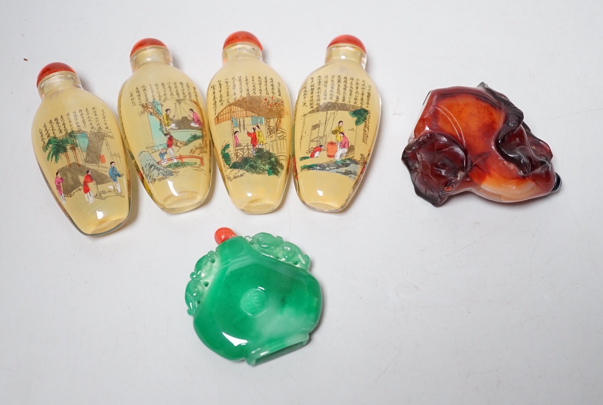 A group of Chinese snuff bottles, tallest 8.5cm including stopper